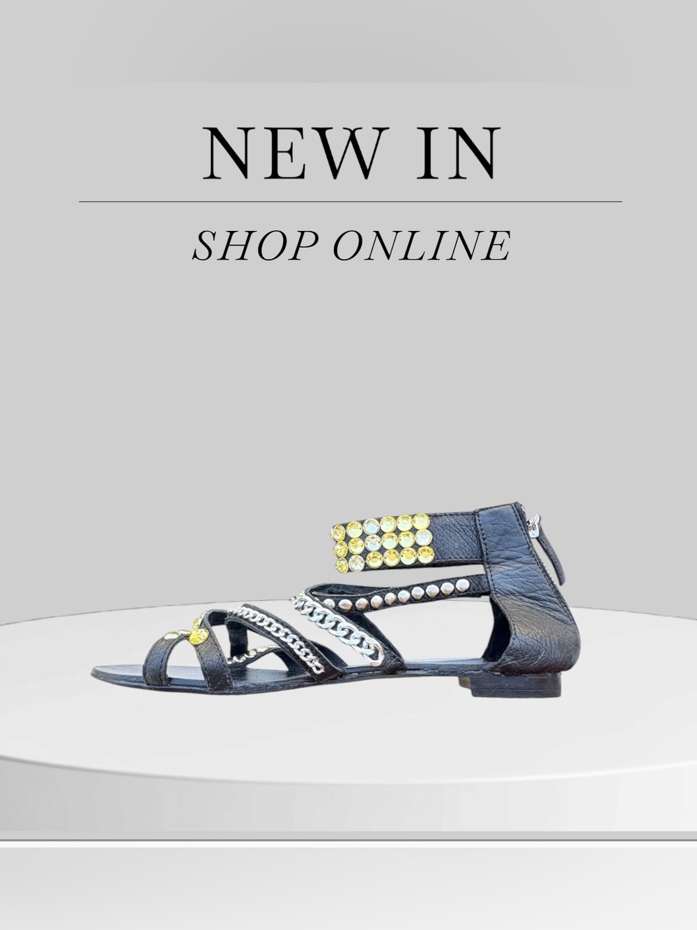 IOANNIS crystal-embellished strappy black leather cuffed sandals 8.5